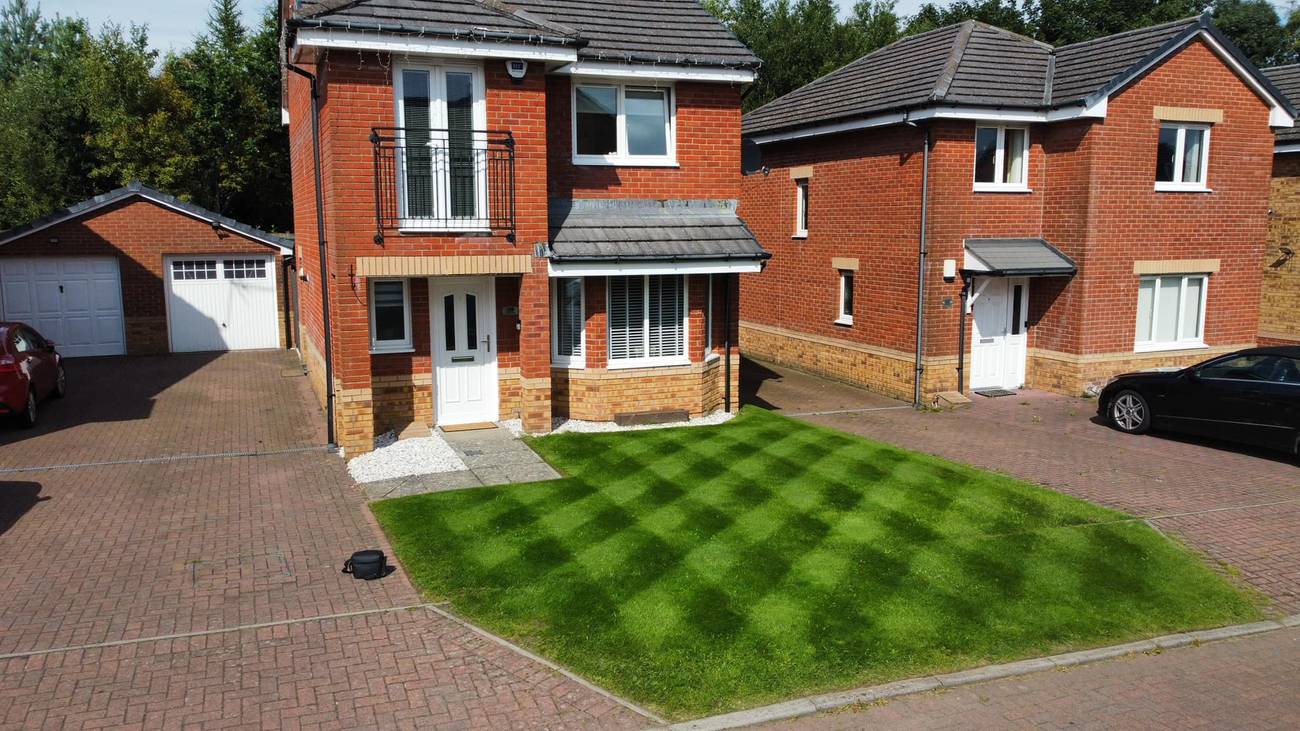 Big wimpey style villa new build with beautiful square lawn cut at the front