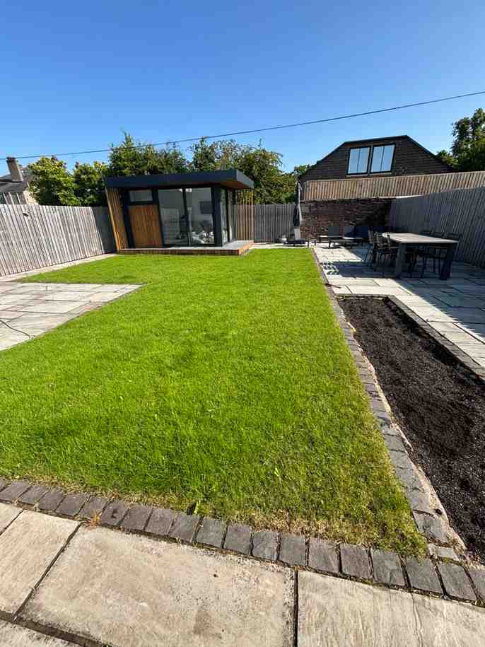 A image of a lawn that has fully recovered and looks as good as new as if it has just been re-turfed, except it hasn't it has been treated by an expert